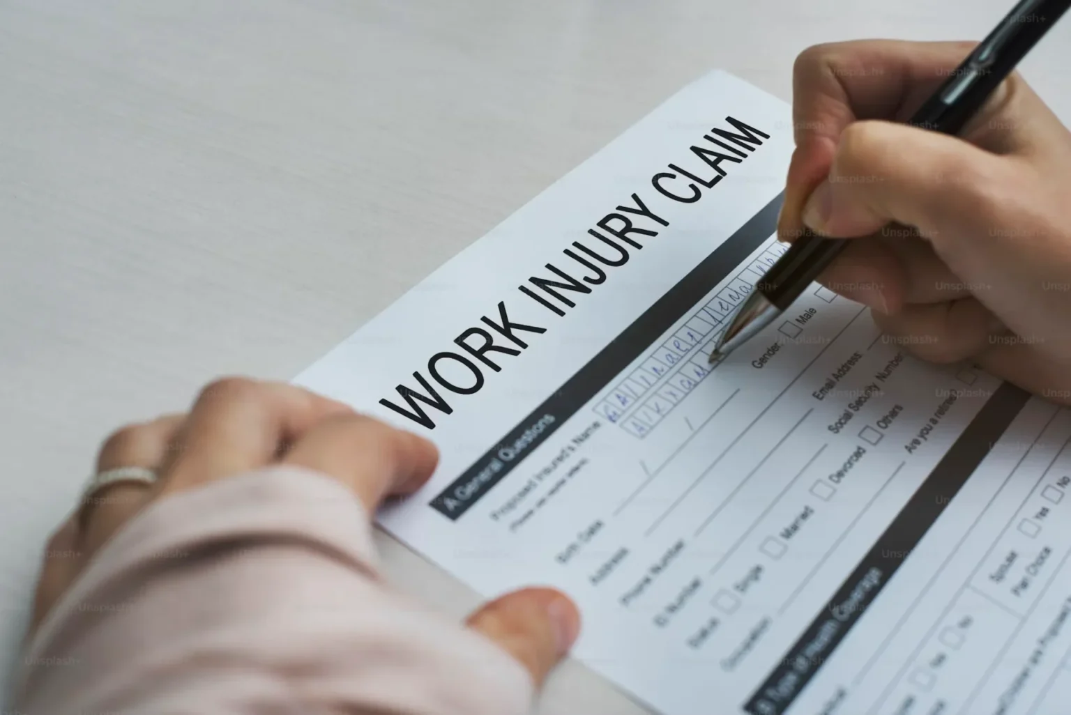 The Process of Obtaining Workers’ Compensation Benefits a woman filling form