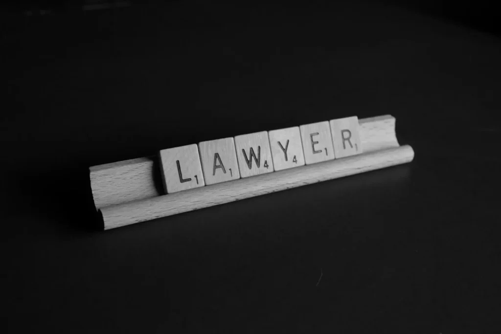 How an Immigration Lawyer Simplifies Complex Visa Applications brown wooden scrabble