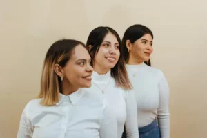 A group of women standing next to each other