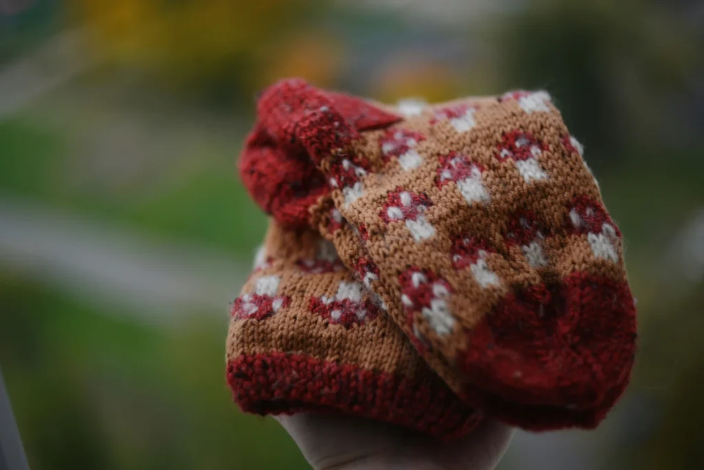 How to Change Your Game in Finding Custom Beanies A person holding caps