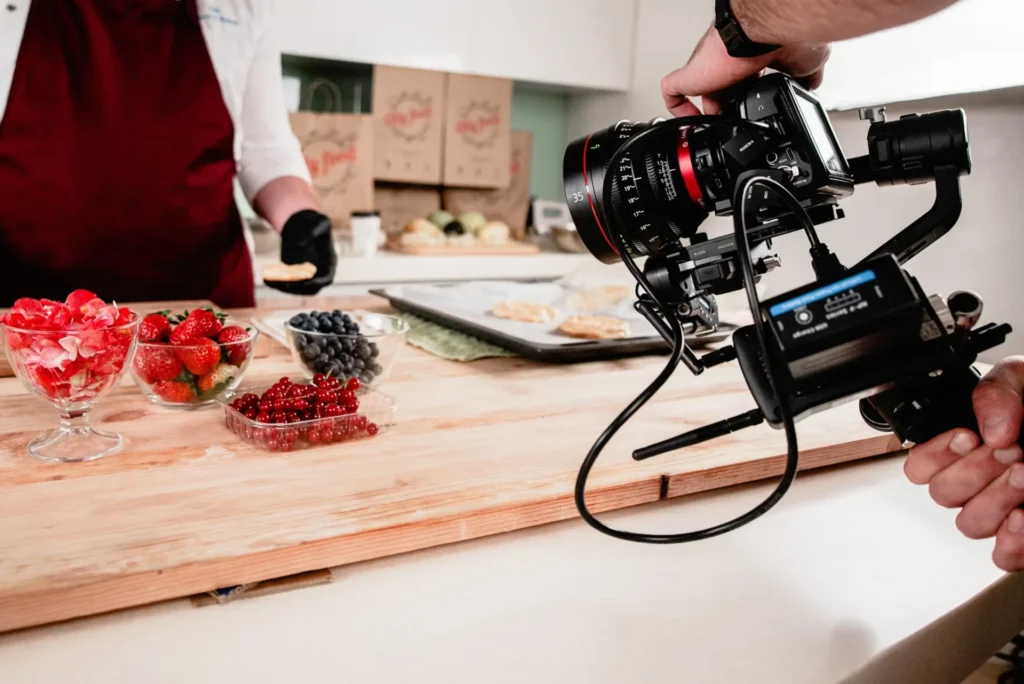 Navigating Food Trends: How Influencers Stay Ahead of the Curve A man capturing a picture of fruit