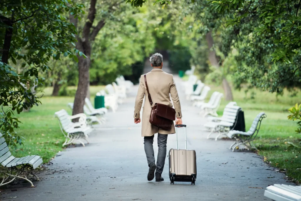 Traveling to Alaska via Seattle? Here’s How to Explore Luggage-Free with Bounce man walking in park