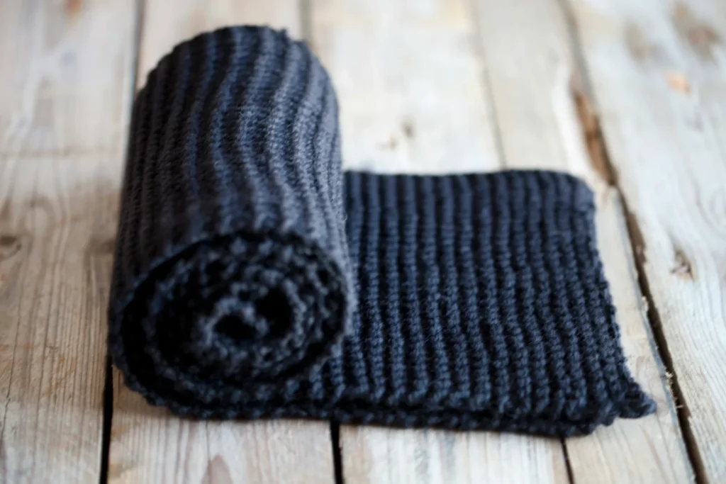 How to Change Your Game in Finding Custom Beanies A rolled woolen piece on floor