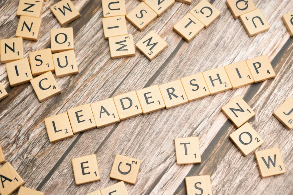 word leadership written with wooden scrabble