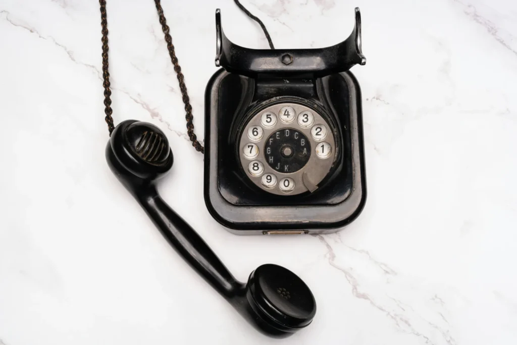 Cloud Call Centers Are Revolutionizing E-Commerce: Is It Time to Adapt? A telephone on white table