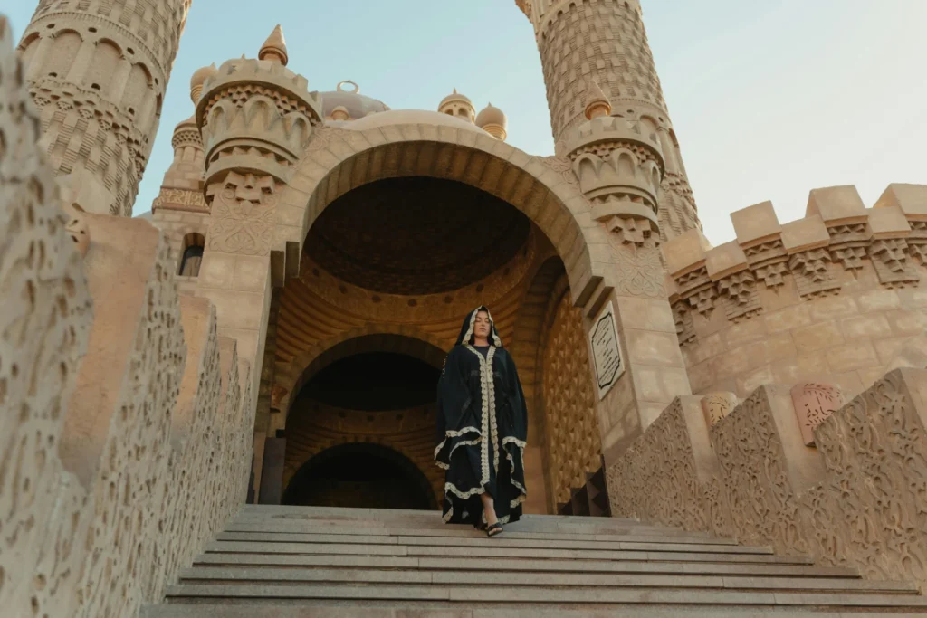 woman wearing a traditional black dress