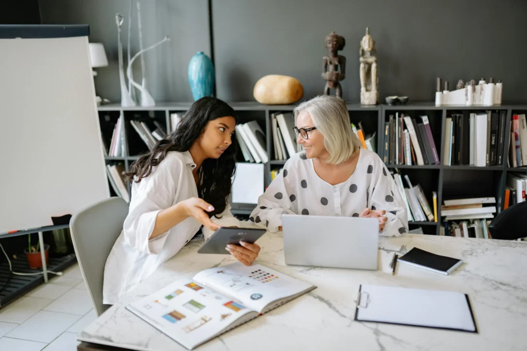 women having discussion at work