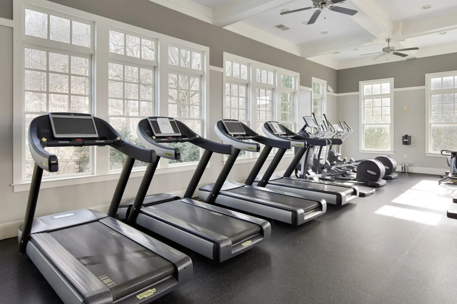 row of treadmills in a room