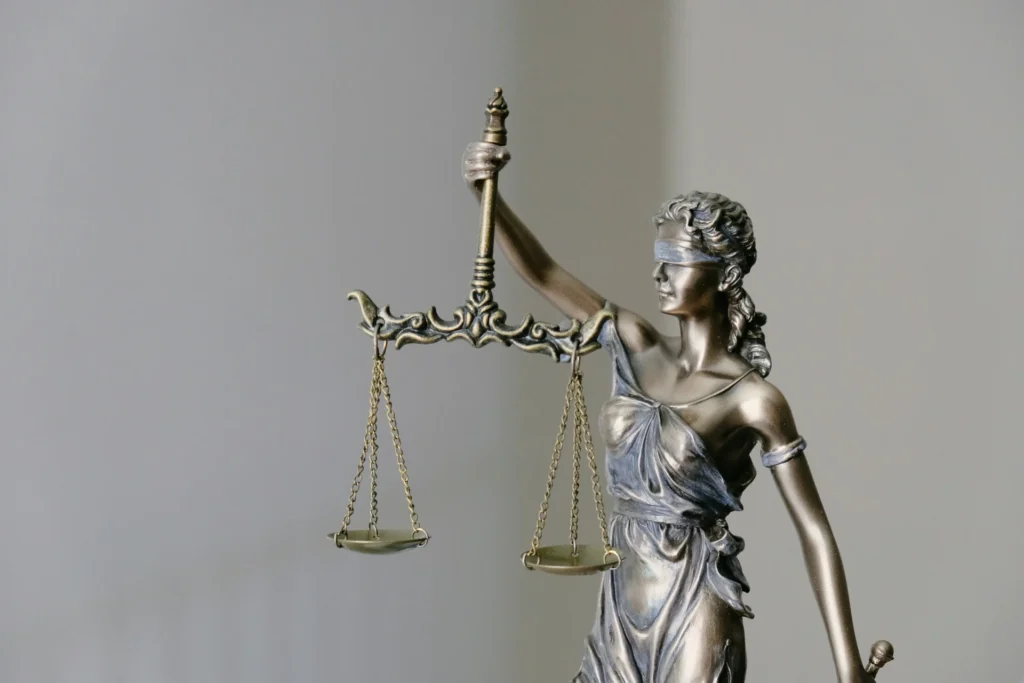 Legal Help for Bone Fractures After Accidents women holding fingurine