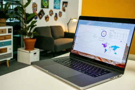 A laptop on white table