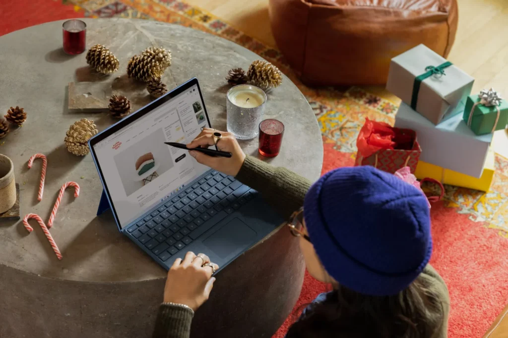 Top Tips for Saving Money While Shopping Online woman using laptop
