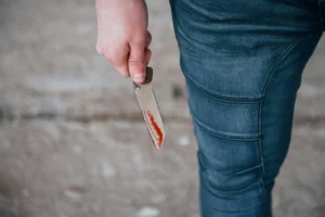 A man holding a knife.