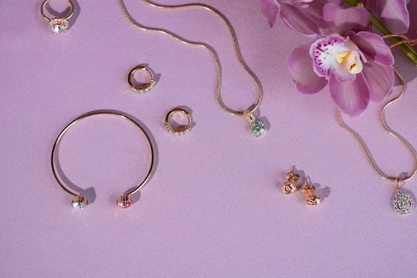 2025’s New Jewelry Trends to Watch Out For: Functional Luxe bunch of jewelry on table