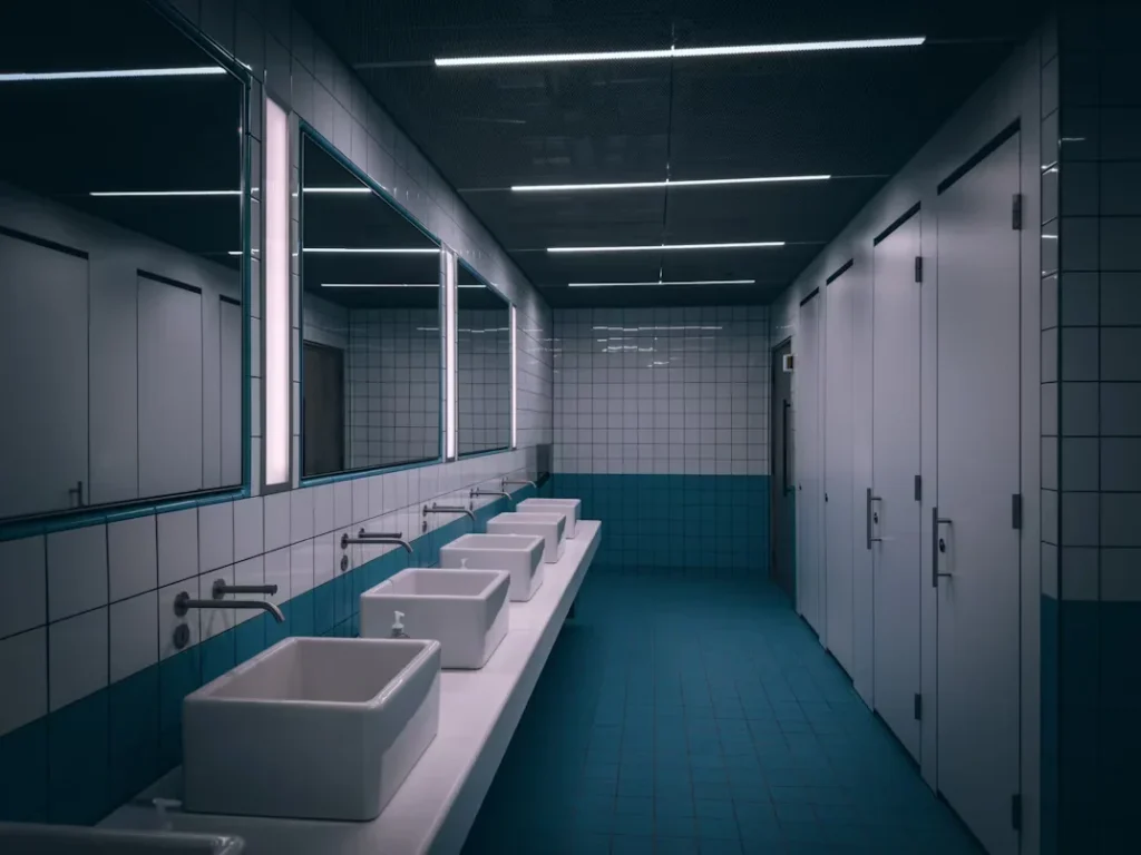 Boosting Workplace Efficiency: How Business Owners Can Improve Employee Comfort and Productivity a row of sinks in public restroom