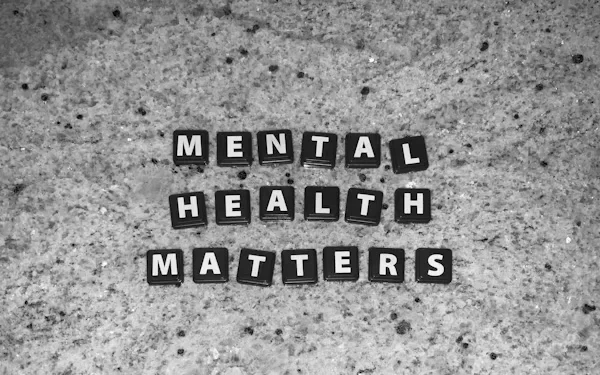 In-Home Mental Health Care vs Outpatient Clinics: Pros and Cons Black and white scrabble tiles