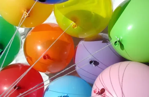 How to Decorate Your Event Like a Pro Without Wasting Time colorful helium balloons in air