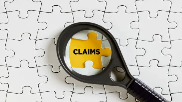Everything You Ever Need to Know About Catastrophe Claims Puzzle with magnifying glass on it
