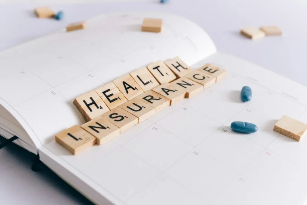 In-Home Mental Health Care vs Outpatient Clinics: Pros and Cons Health insurance scrabble tiles