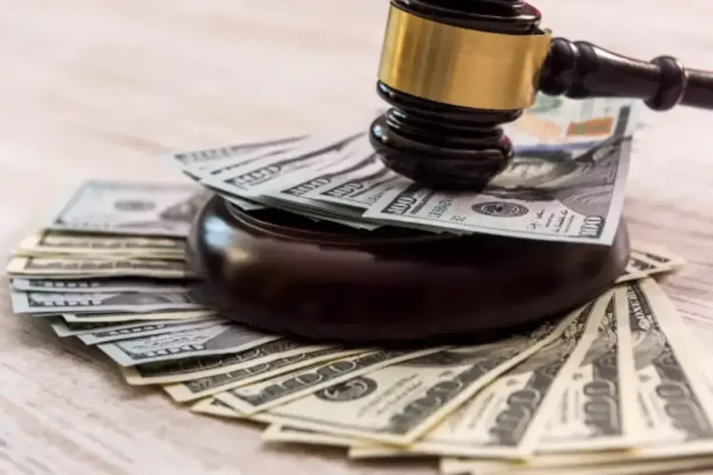 Breaking Down the Costs of Hiring a Felony Defense Attorney Judges gravel on money