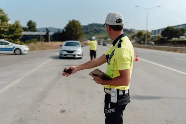 Vital Tips to Improve Projects Using Hired Traffic Management Experts police officer standing on road
