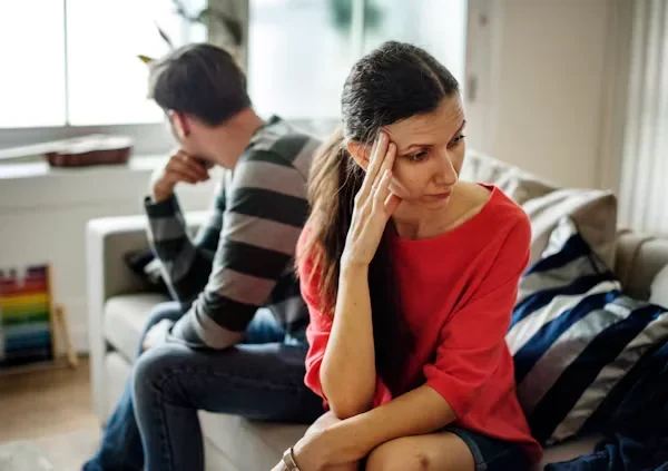 7 Signs It Might Be Time to Seek Counselling Support in Your Relationship woman sitting on couch