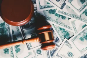 wooden judge gravel with money