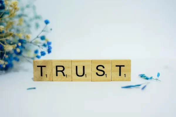 7 Signs It Might Be Time to Seek Counselling Support in Your Relationship word trust written with scrabbbles