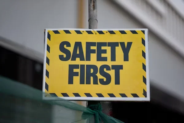Why Every Company Needs a Health and Safety Strategy in 2025 Yellow and black safety sign