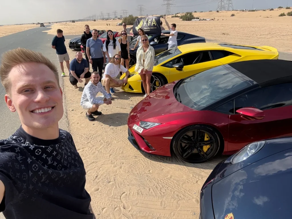 a man taking selfie with friends