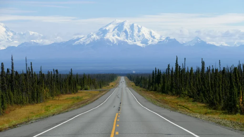 a road with yellow and white lines