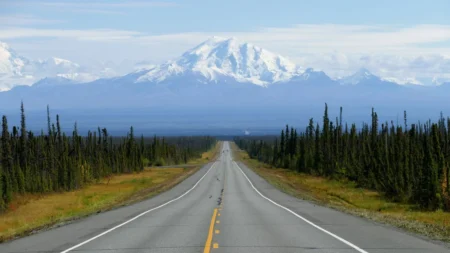 a road with yellow and white lines