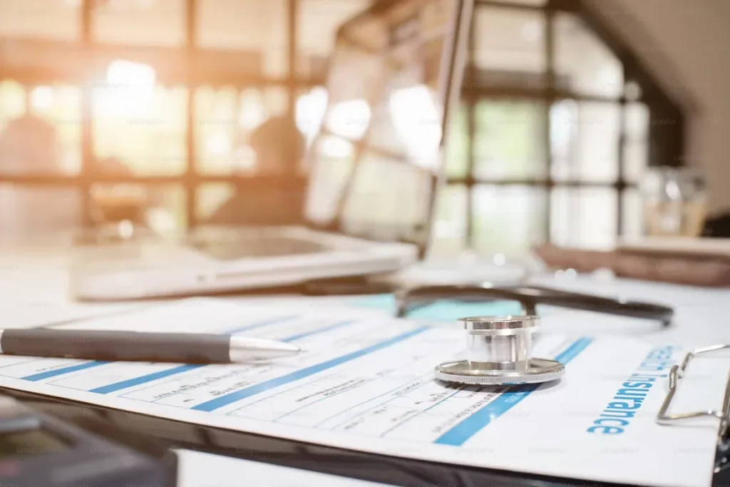 What You Need to Know About Overseas Visitor Health Insurance a stethoscope on a paper