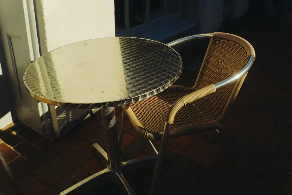 Why French Bistro Chairs Are the Ultimate Blend of Style and Durability in Cold Climates a table and chairs on patio