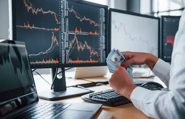 Cryptocurrency Auto Invest A Tool to Simplify Crypto Portfolio Management a woman holds money in her hand