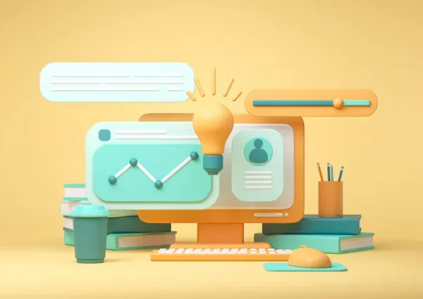 a yellow computer on a table with several books.