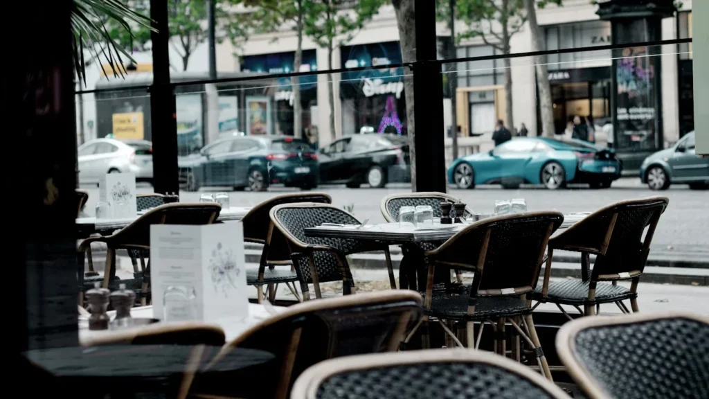 Why French Bistro Chairs Are the Ultimate Blend of Style and Durability in Cold Climates black and brown metal chairs and tables