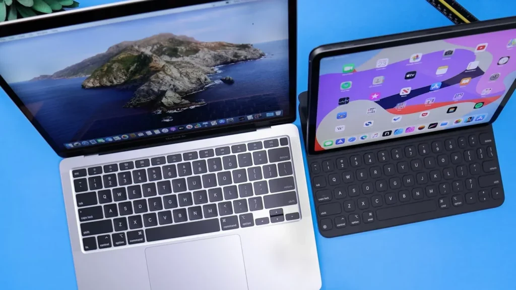 Is the Refurbished 2017 MacBook Air Still Worth It in 2025? mac book besides ipad on table