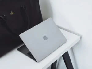 opened mac book on table