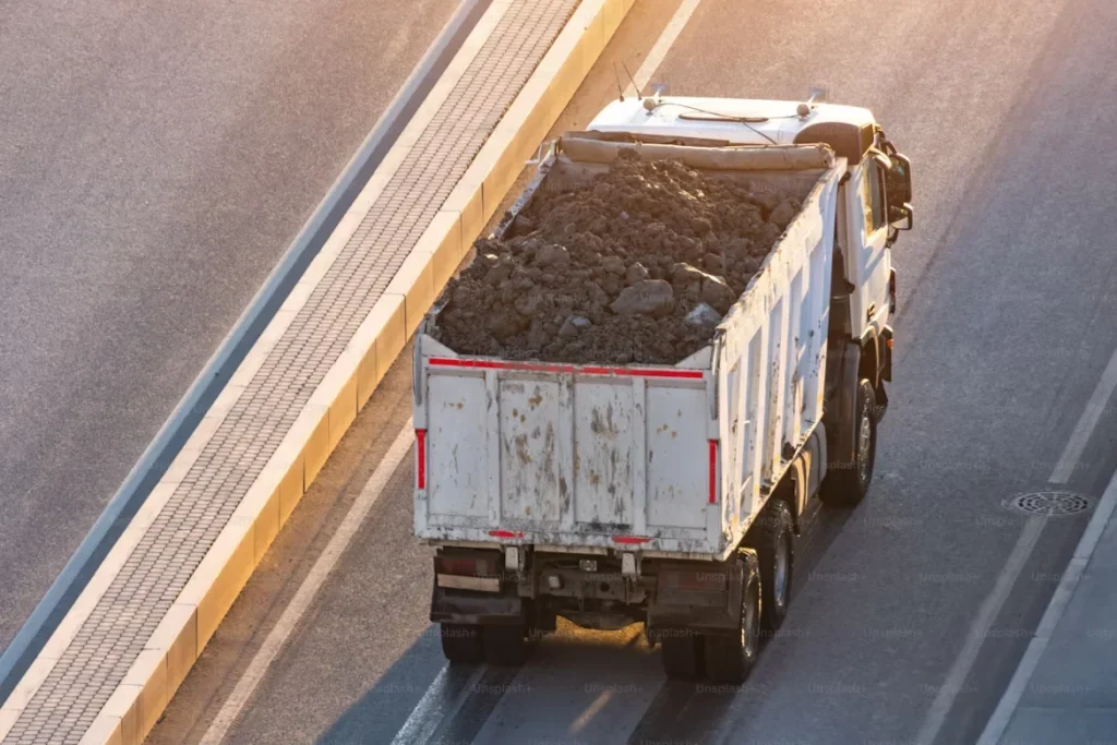 Why Truck Accident Cases Are Often More Complicated Than Car Accidents truck loaded with soil in the back