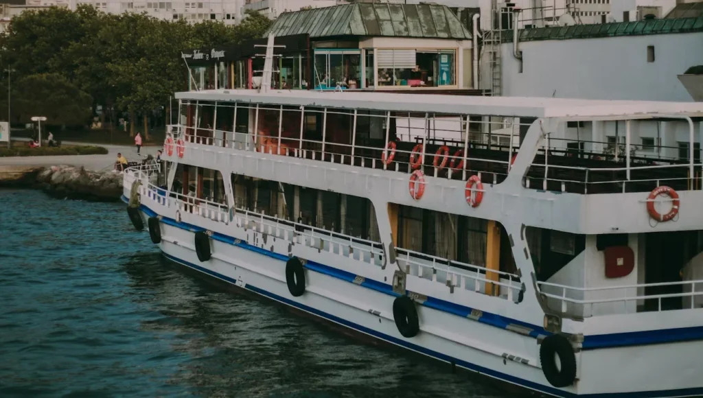 From Castles To Vineyards: What You’ll See On A River Cruise white and blue boat on body of water 2