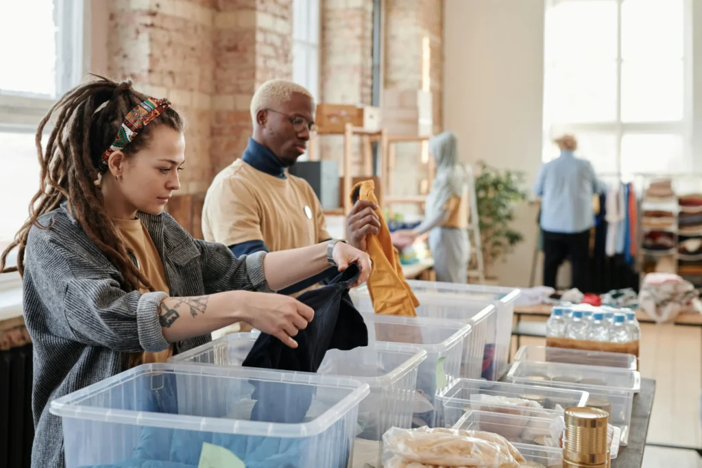 woman and man sorting clothes