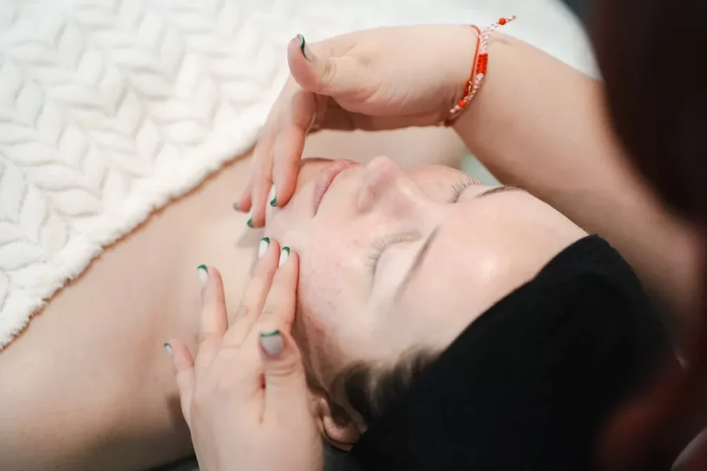Career Paths in Cosmetology: From Salon Chair to Beyond woman enjoying a face massage