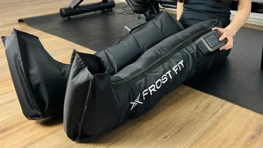 7 Surprising Benefits of Compression Boots for Recovery Legs a woman wearing long boots