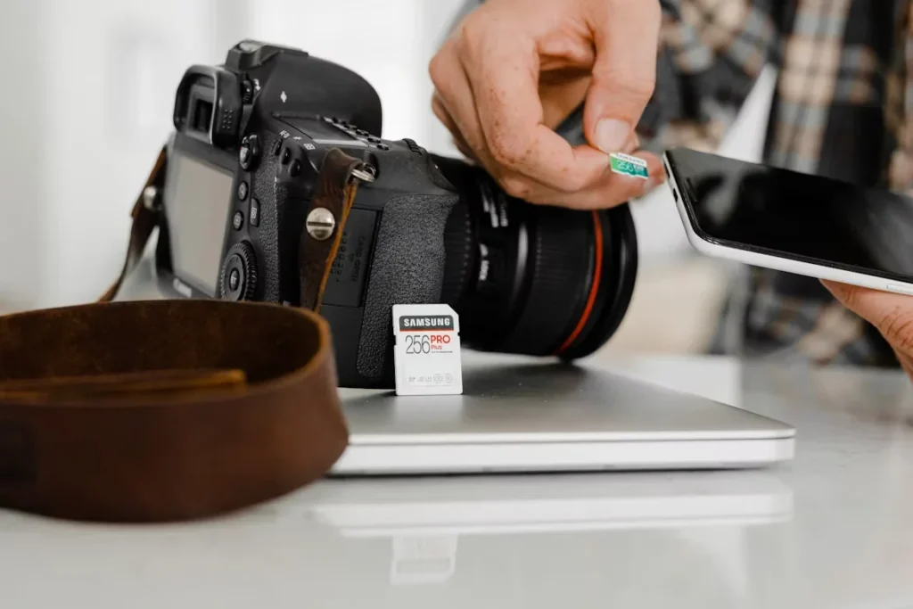 Top Reasons to Choose Reliable Micro SD Cards A person installing SD card in phone