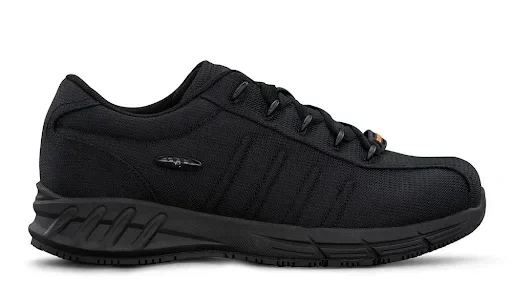 Non-Slip vs Slip-Resistant Shoes: Why the Difference Matters Black joggers on white table