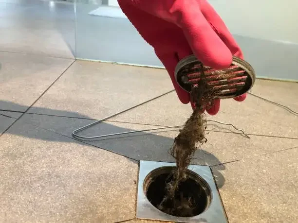 Drain blockage due to waste materials