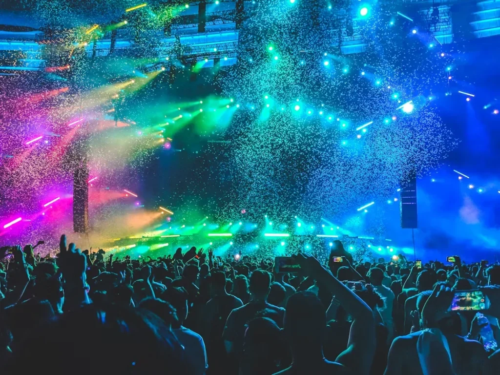 a group of people in front of stage