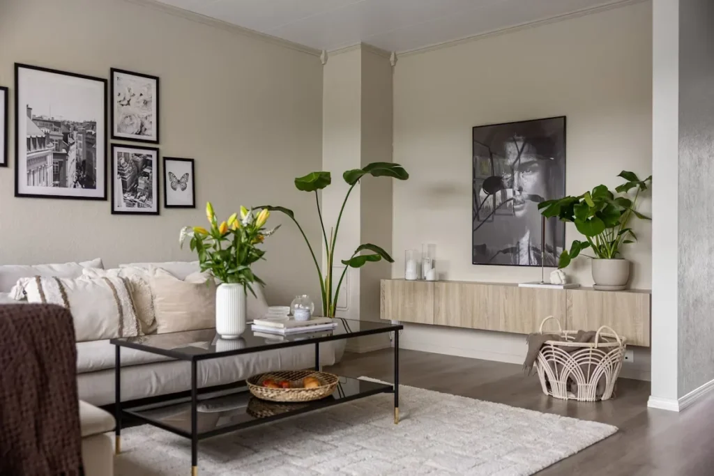 How to Upgrade Your Living Room Without Spending a Fortune on New Furniture a living room filled with furniture and plants