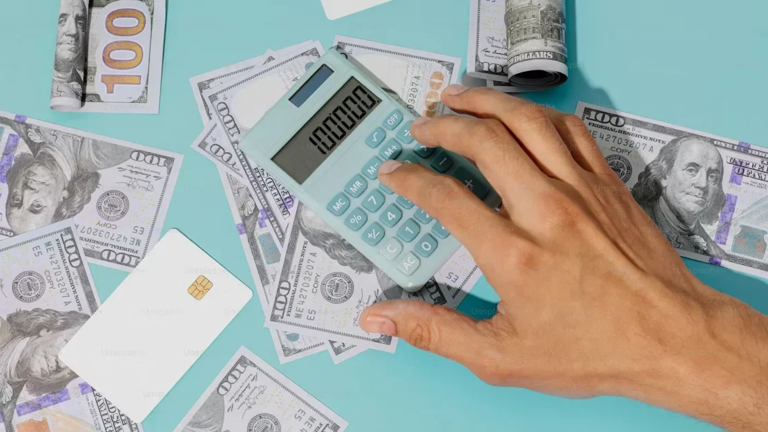 Increasing Efficiency with Heavy Duty Tape in Bulk a person holding a calculator