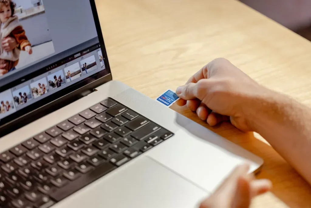 Top Reasons to Choose Reliable Micro SD Cards a person using laptop